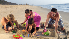 children playing on the beach
