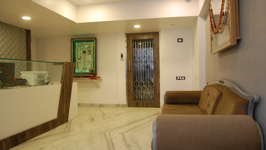 Sanmukh by Adamo - a couch in the reception area of our hotel in Rajasthan