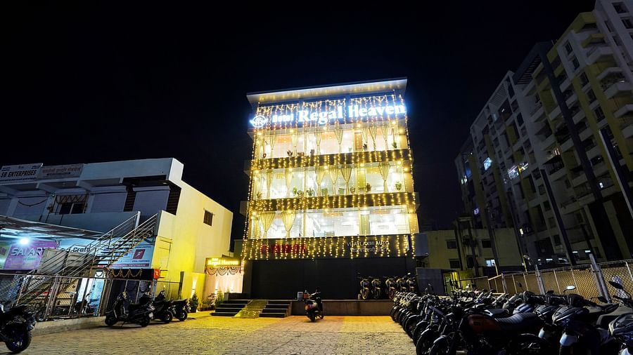 Facade image of Hotel Regal Heaven, Pune at night.