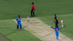 cricketers celebrating after winning a match