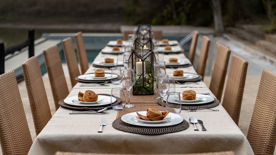 Front view of dining setup near Swimming Pool at Saccharum Safari Lodge, Balaghat