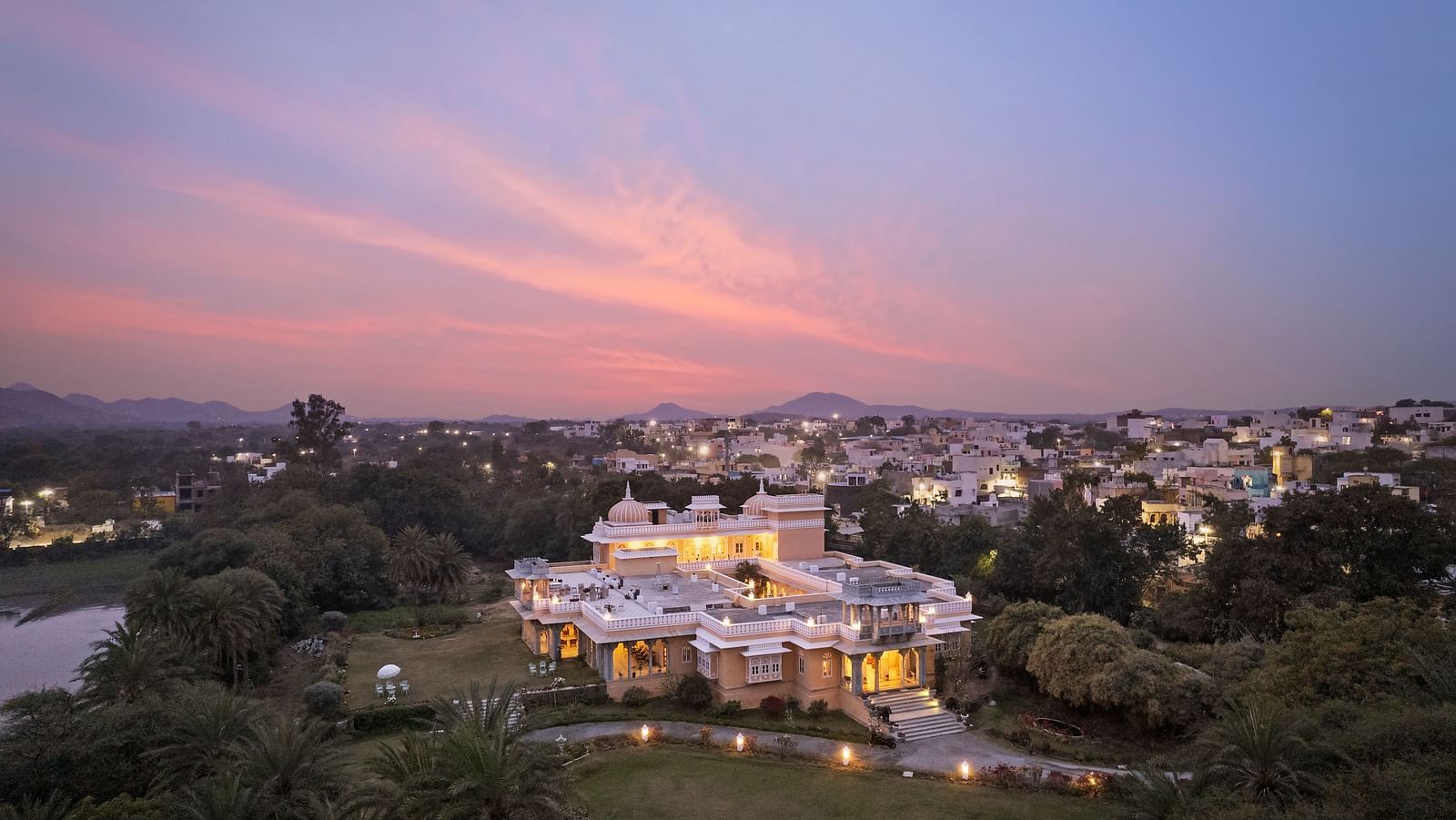 Facade image of Dev Shree, deogarh featuring a beutiful sunset in the background
