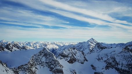 High Peak Mountain Covered Snow Under Blue Sky