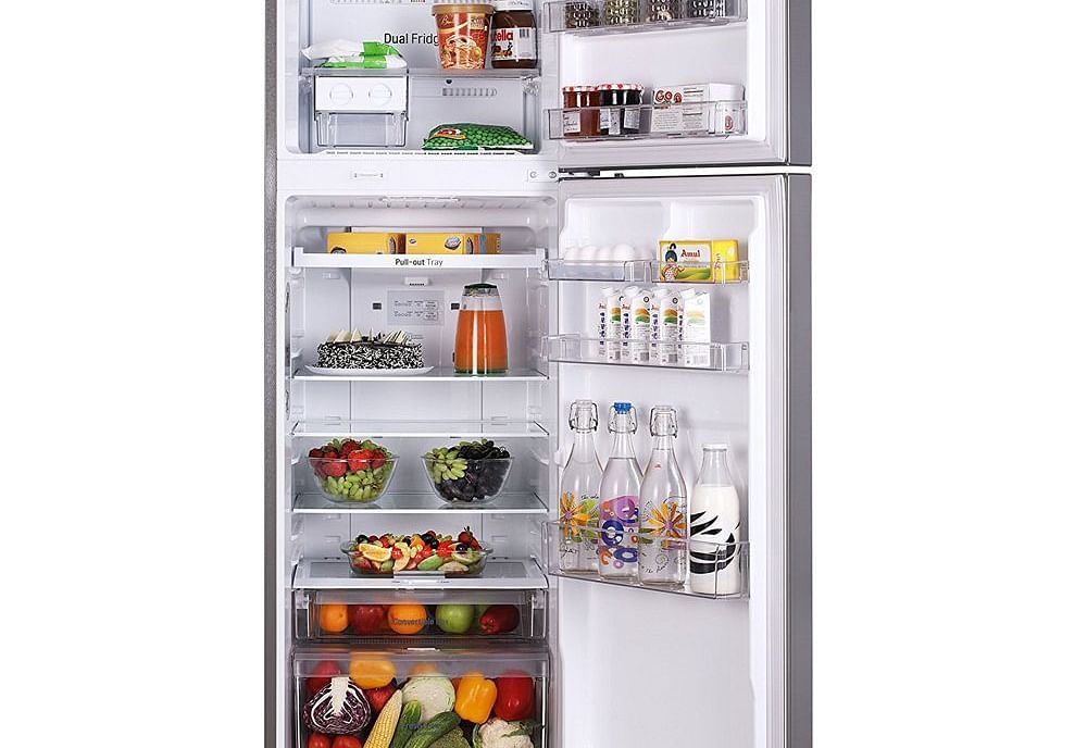 Image of a fridge filled with a variety of food.