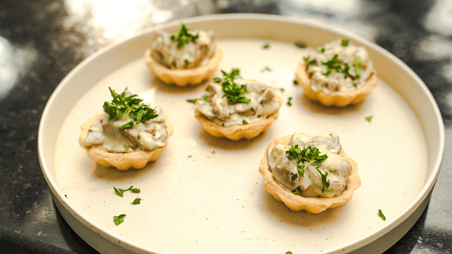 Delicious savoury tarts filled with creamy mushrooms and garnished with fresh parsley - Shervani Pebbles & Pines, Corbett 
