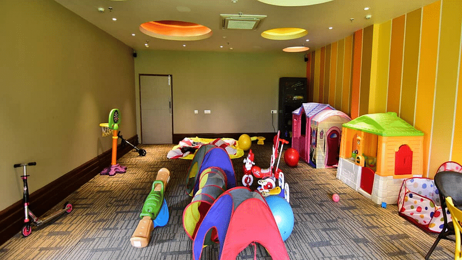 Breakk-game zone area of Swosti Chilika Resort with a scooter and other items for kids