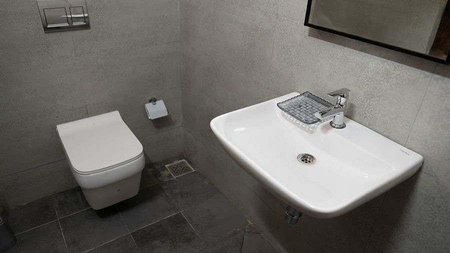 Top view of a sink and toilet at the 1 bhk Executive Studio Apartment, Vistar Holidays, Goa.