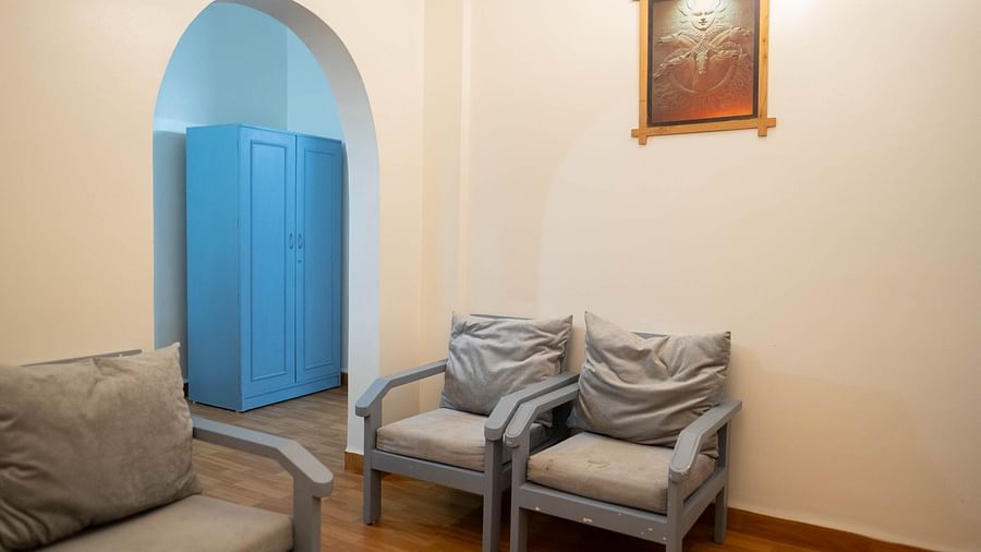 Image of a seating area with sofas and an arched doorway at 1 bhk Deluxe Studio Apartment, Vistar Holidays, Goa.