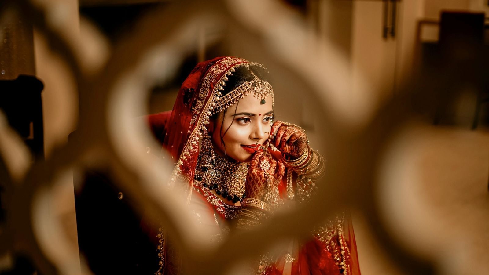 A bride putting on her nose ring