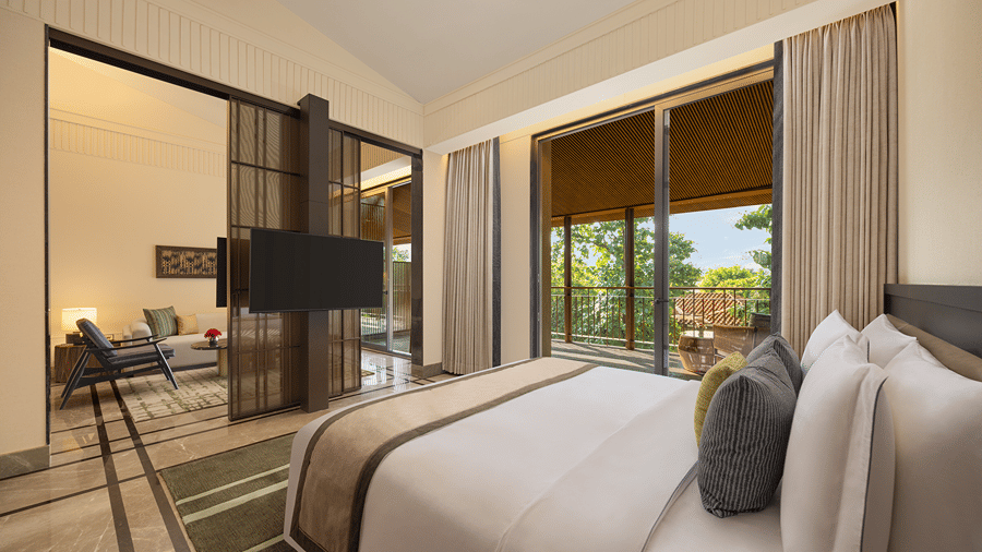 Bedroom in the Sanctuary Suite at The Riverview Retreat, Corbett, with a king-size bed and seating area.