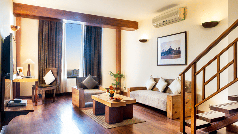 The sitting area and the stairwell leading to the bedrooms of our penthouse suites in Jaipur | Clarks Amer, Jaipur