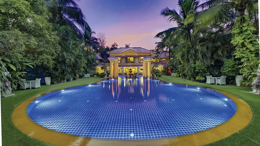 view of the swimming pool and the property behind it - Mayfair Lagoon, Bhubaneswar
