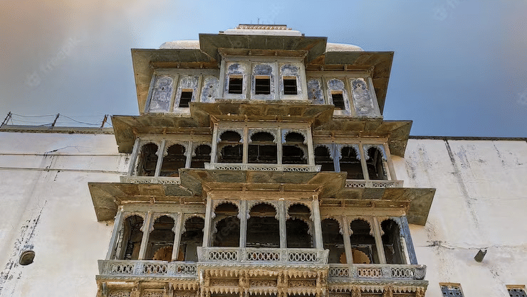 Facade of Sajjangarh Palace, featuring numerous windows