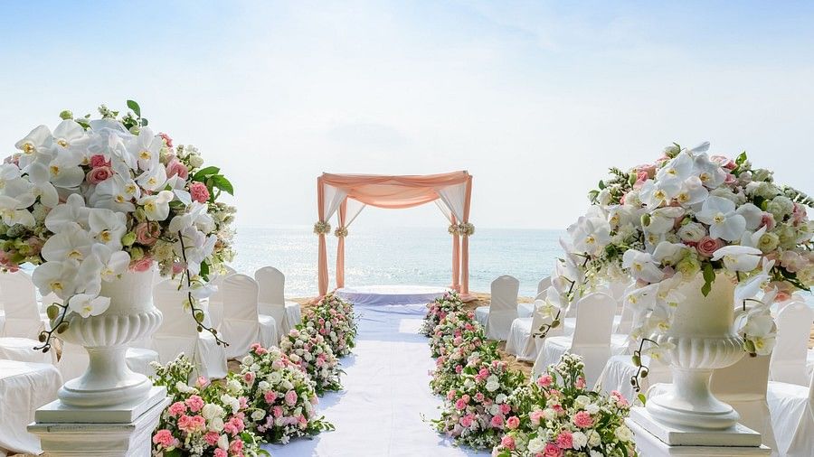image of the wedding setup featuring the aisle with flowers in the sides of the path - Maikhao Dream Villa Resort & Spa, Phuket
