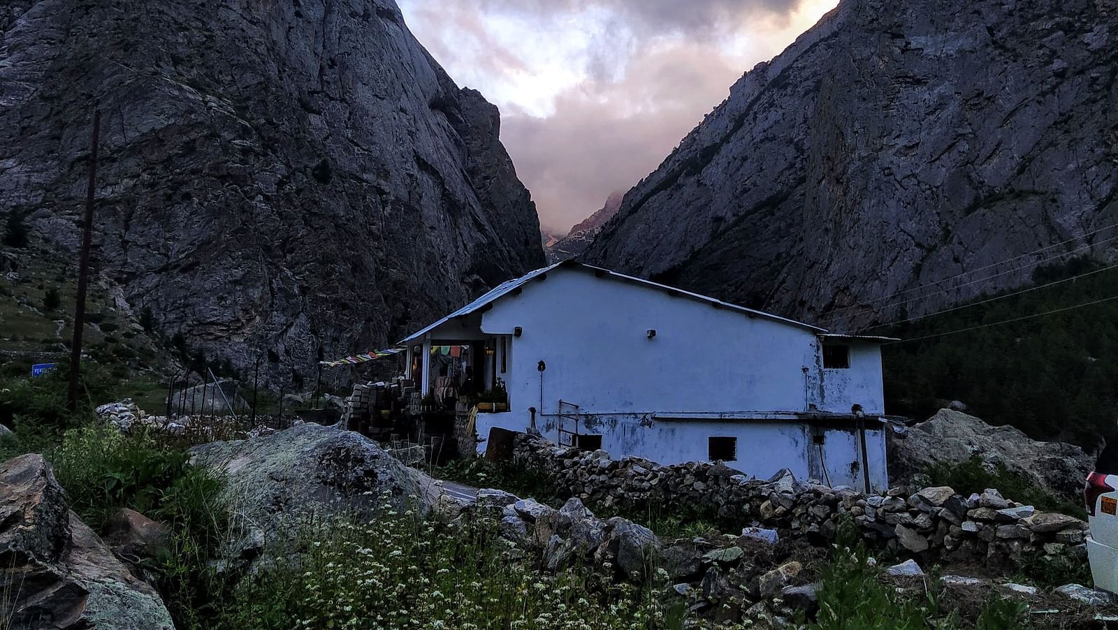 Aerial view of Niti Valley with a house between two valleys | Faraway Cottages, Auli