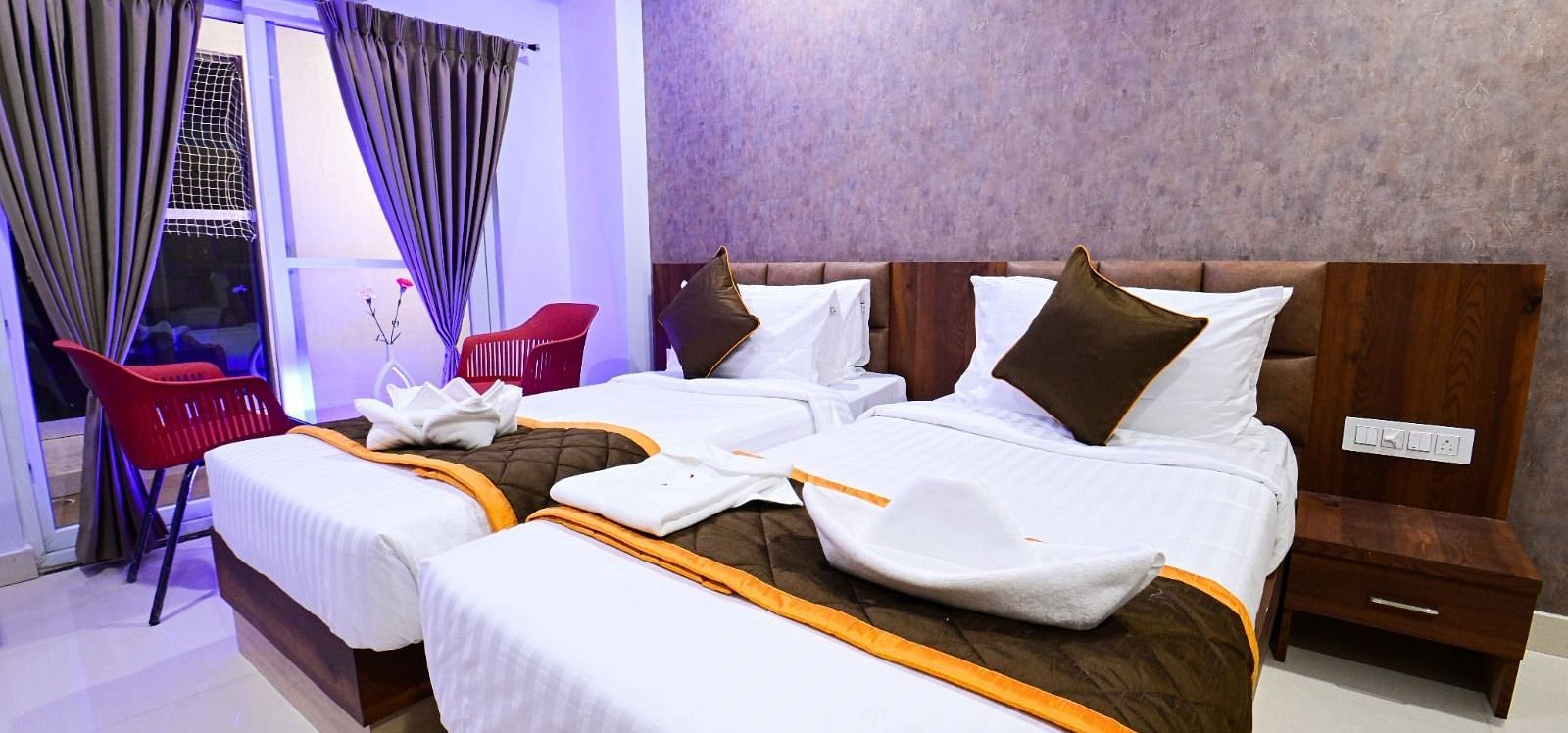 view of the twin beds of Twin Deluxe Room at South Square Hotel, Bengaluru