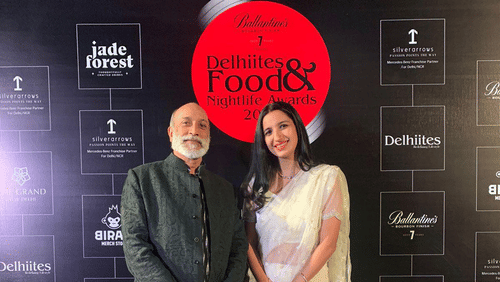 a man and a woman posing for the picture