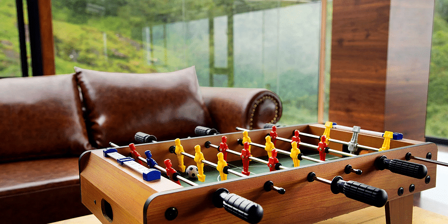 Shot of a Foosball table at the game zone of the villa | Ibex Stays and Trails, Valparai (Tale Rock)