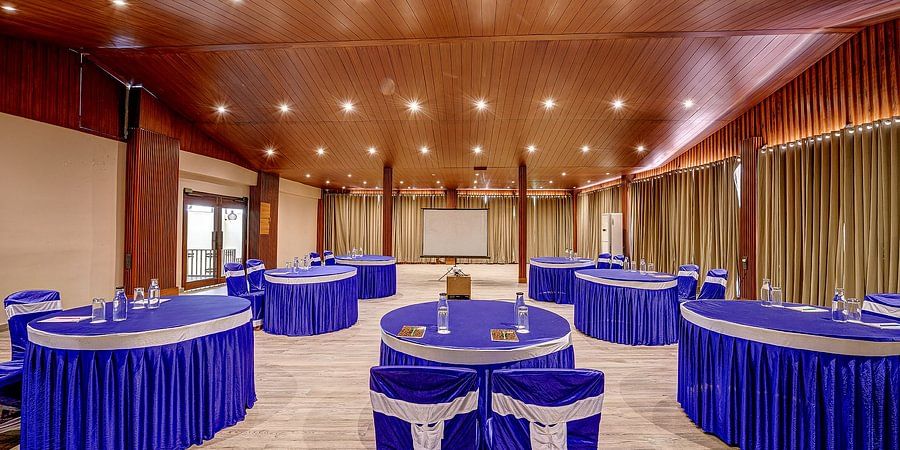 A spacious area with a round seating arrangement in the Conference Hall at Silver Sand Beach Resort, Havelock.
