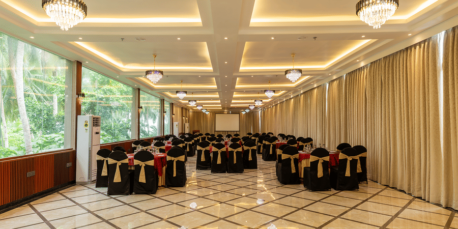 Banquet hall with elegant lighting and chair decor at Silver Sand Sea Princess Beach Resort, Port Blair.