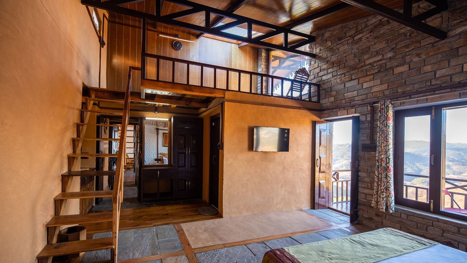 Comfortable rustic room interior with a charming wooden loft and natural furnishings. - Blusalzz Homes The Himalayan Bungalow, Almora
