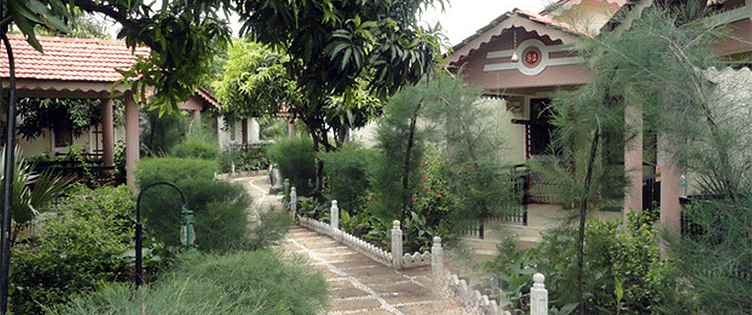 Pathway between cottages at Saavaj Resort