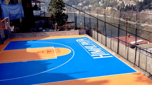 Basketball play area with a river view at Himalaya Hotel, Nainital