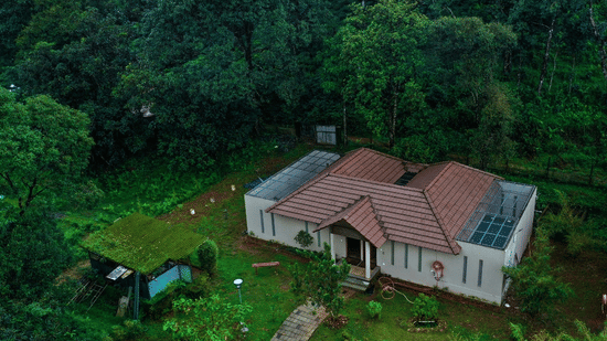 An aerial view of the Private pool villa that is surrounded by greenery - Abad Brookside Lakkidi, Wayanad