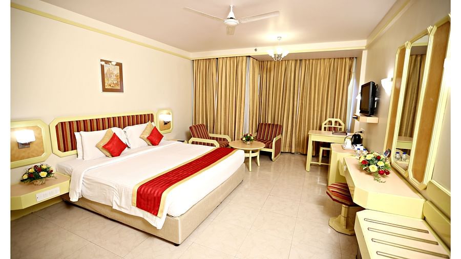 the king size bed offered at Executive Rooms in Vizag 0