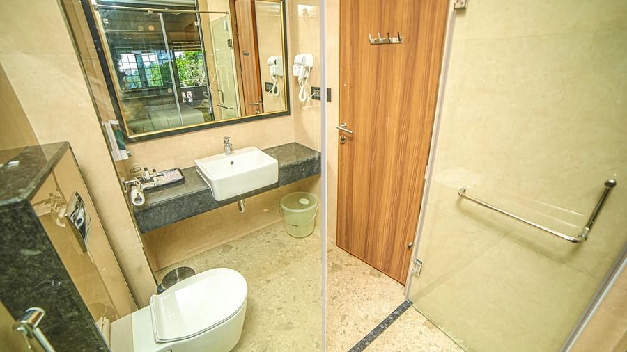 Washroom in the Premium Balcony Room at Grand Palace, Yercaud
