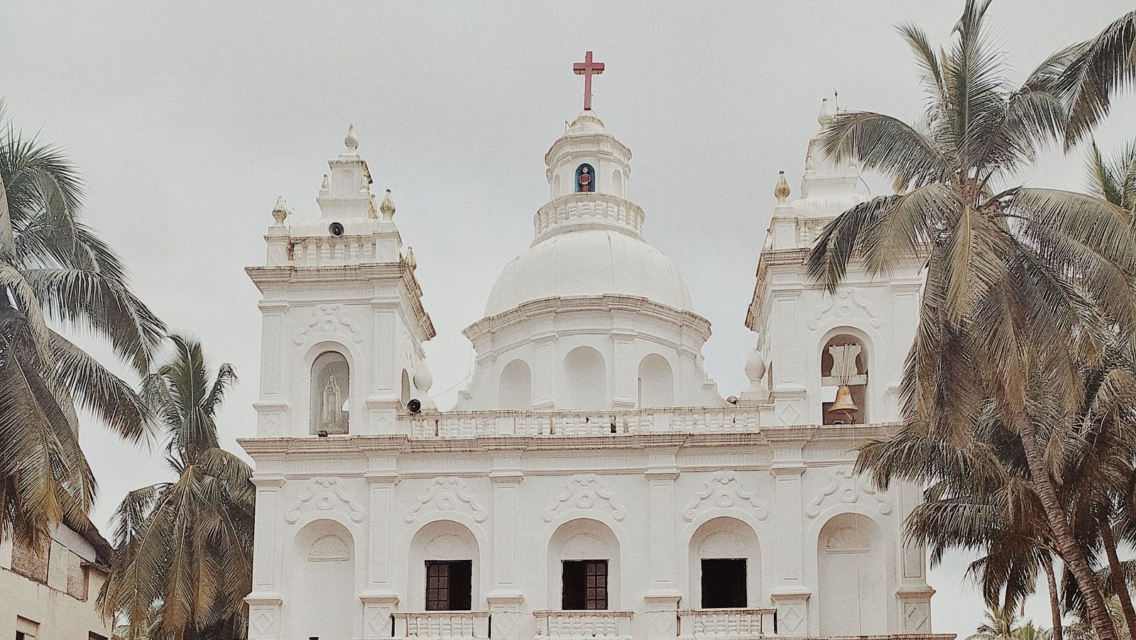 image of a church daytime with stone foyer in front of it