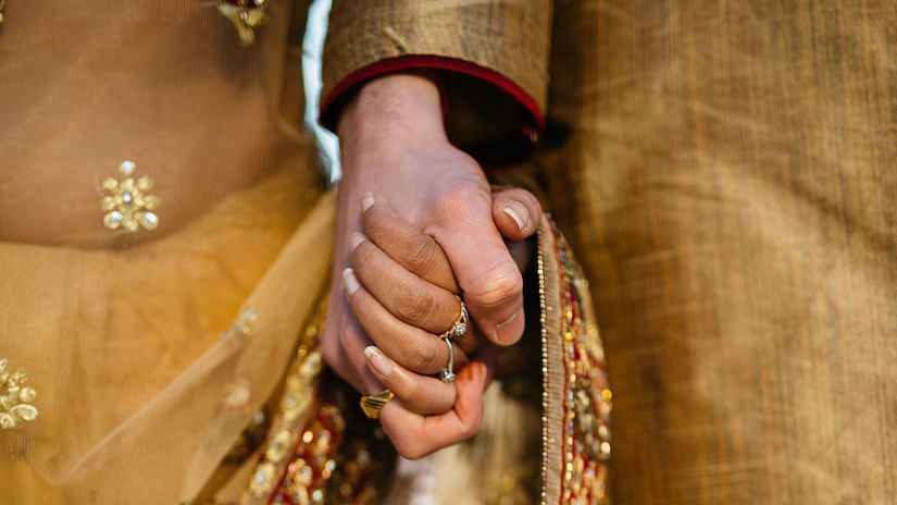 A couple holding hands