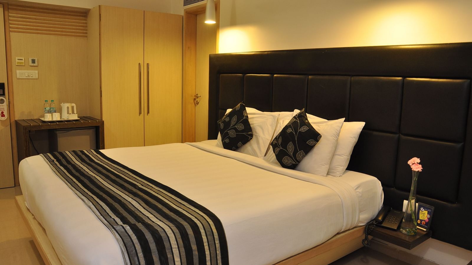 Image of Premuim king room with large bed abd moden amenities at The Oriental Residency