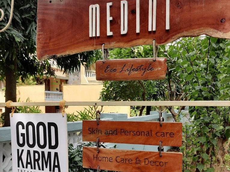 a plaque of Medini - Good Karma highlighting their eco-conscious USPs