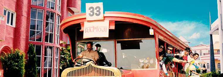 Backlot tour by red vintage bus - Ramoji Film City