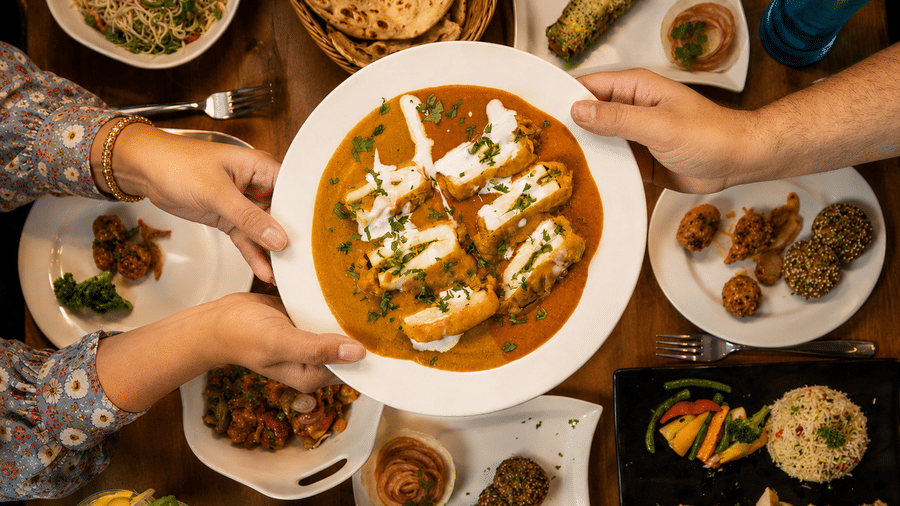 Assorted Indian dishes served for a delightful dining experience at Pride Ashiyana Resort Mussoorie.