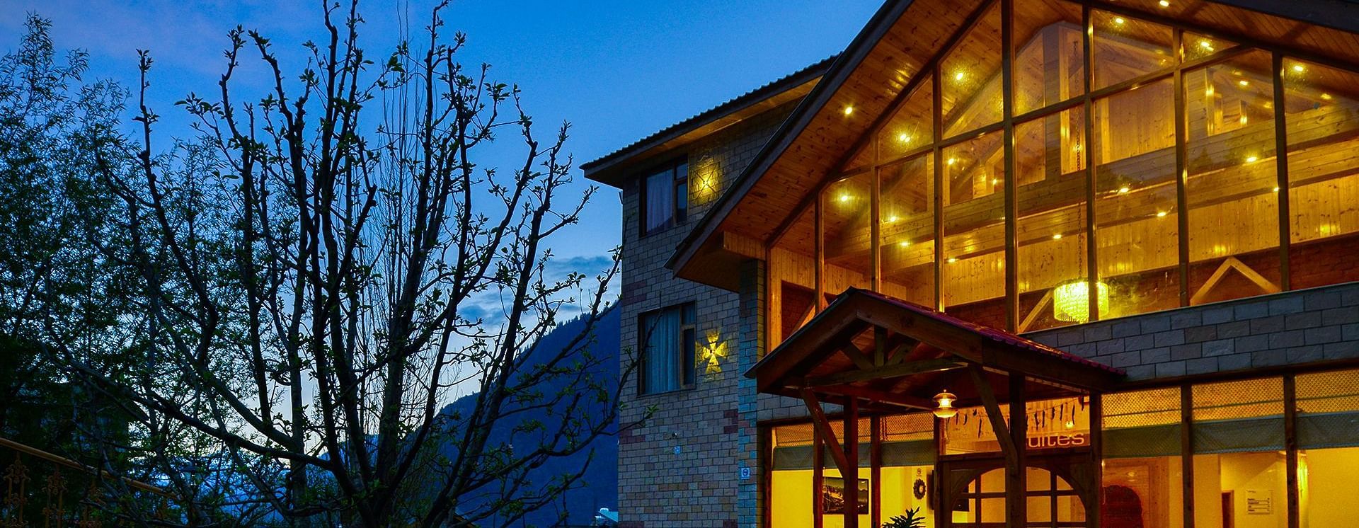 Clarks inn Manali Facade with light blue in the background