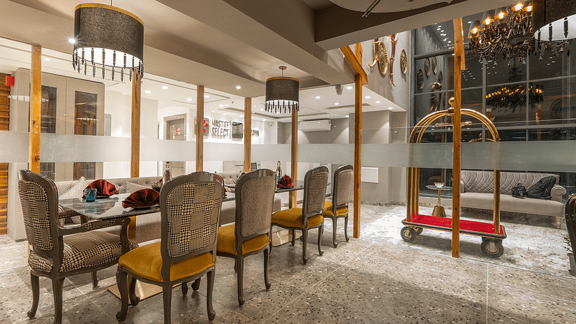 an image of outer view of dining space covered by glass at Mastiff Select Mandavya Dharamkot, McLeodganj