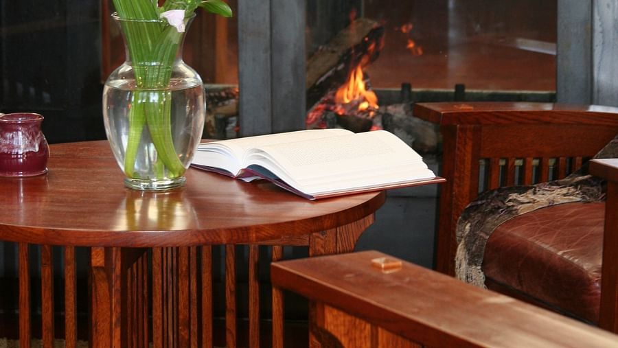 Fresh flowers in a glass vase adding a touch of elegance to the table - Brewery Gulch Inn & Spa