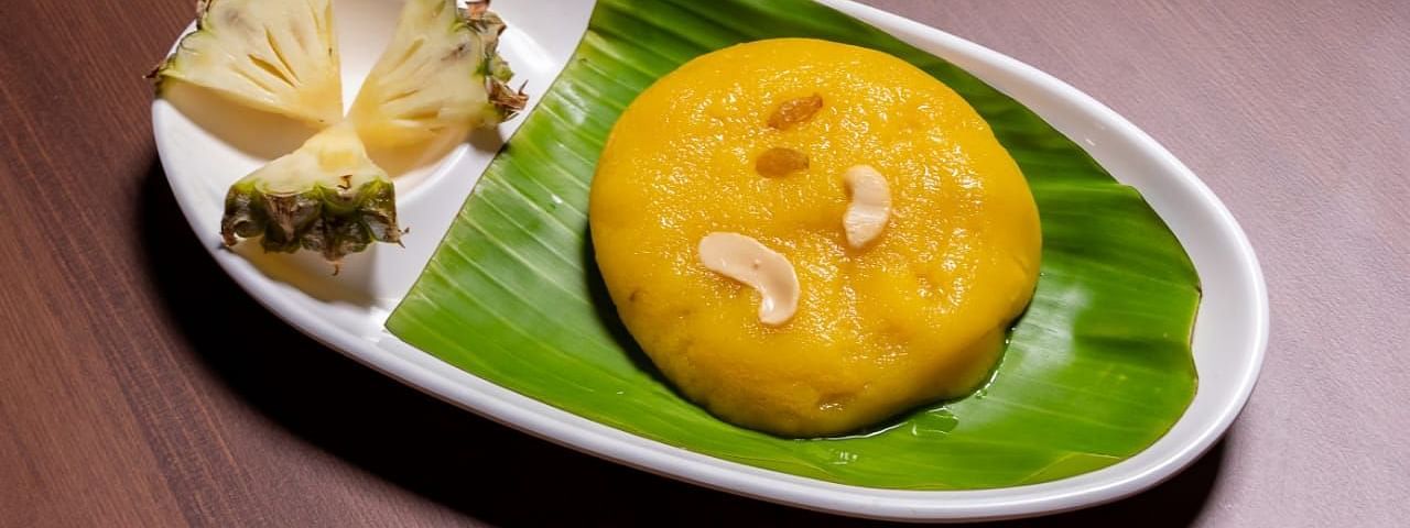 Rava Kesari on a plate from Mulbagal Dosa at Hotel Pai Viceroy Jayanagar