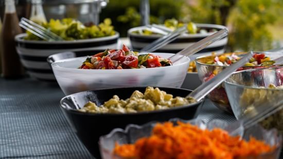 bowls of food at a buffet