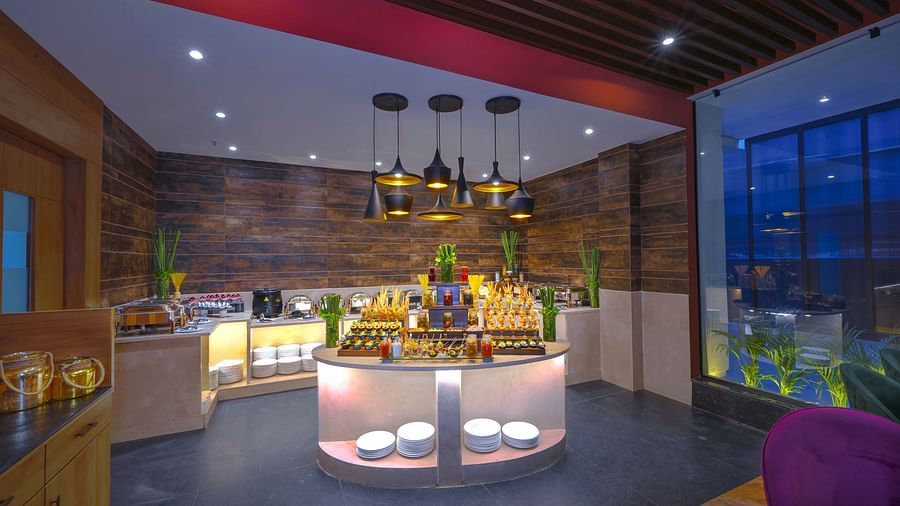 A restaurant area of Royale Sarovar Portico, Agra