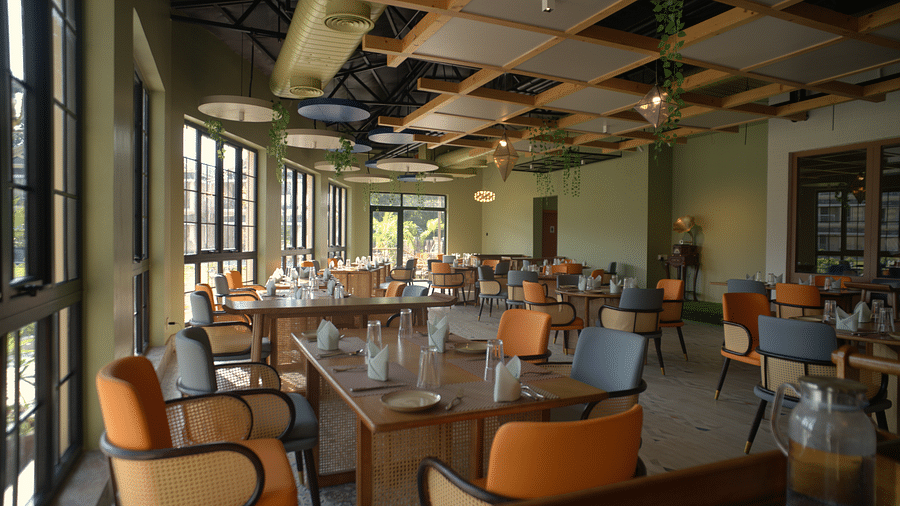 Image of Verbana restaurant with tables and chairs at Voyage the Solitaire Bliss.