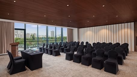 Carnival 1 with comfortable seating facing the stage at Essentia Premiere, Pune.