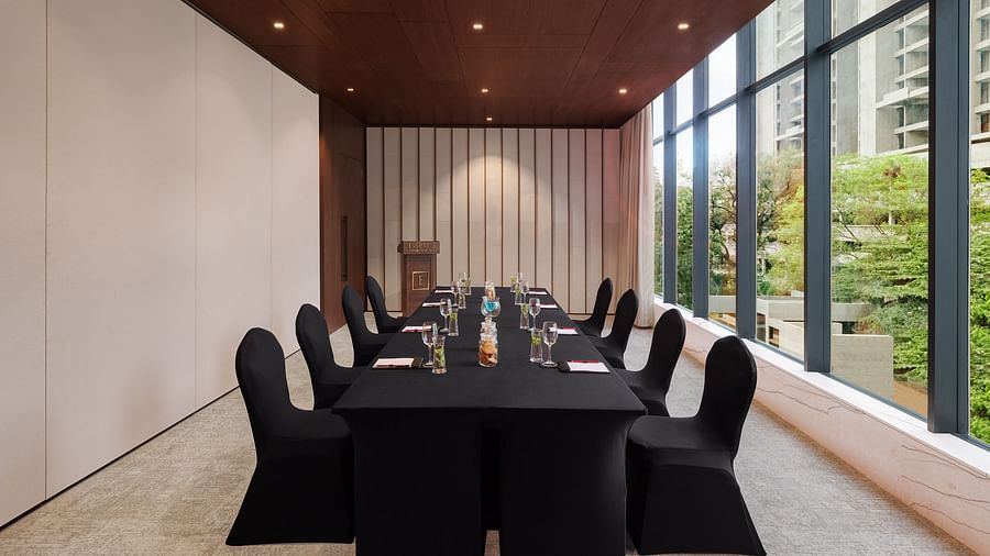  Carnival 1 with comfortable chairs facing towards the table at Essentia Premiere, Pune