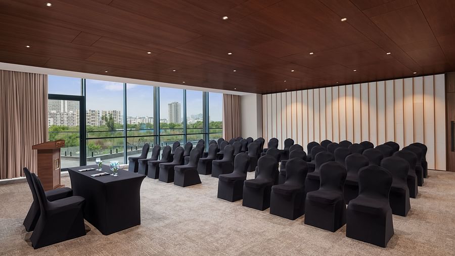 Carnival 1 with comfortable seating facing the stage at Essentia Premiere, Pune.