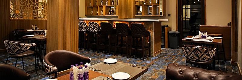 Rosetum Kasauli - The sunset bar restaurant seating arrangement