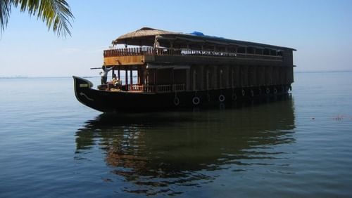 a Shipping in lagoons in Kochi floating on the water captured during the day