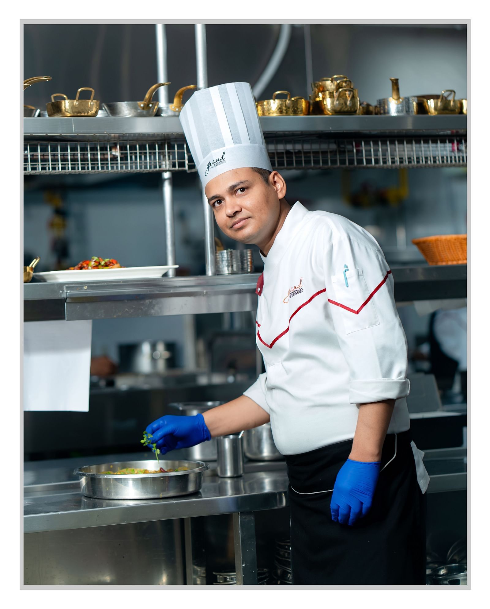 A photo of Mr. Prasenjit Ghosh preparing a meal.