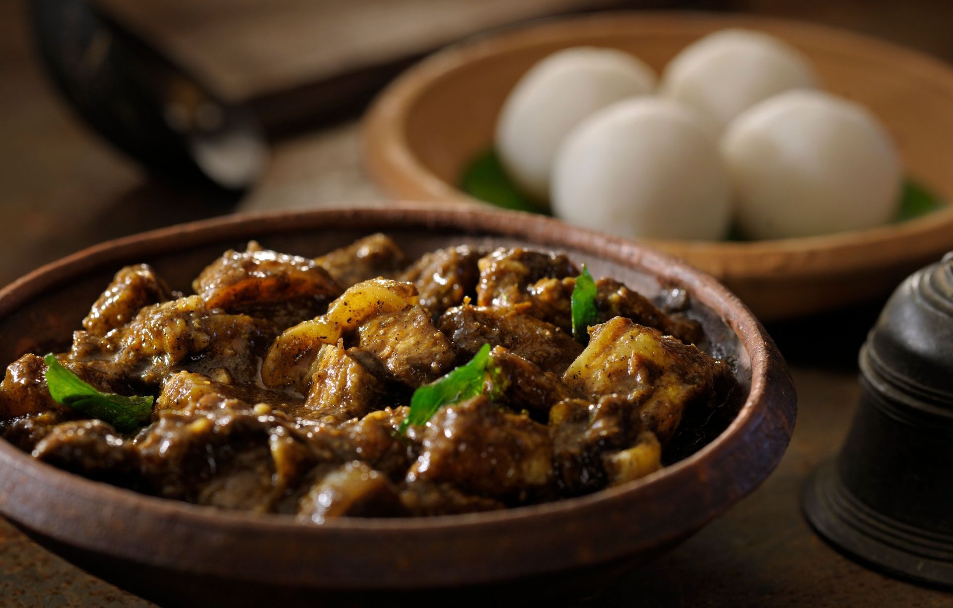 Coorg Pandi Curry with Kadambattu (rice balls).